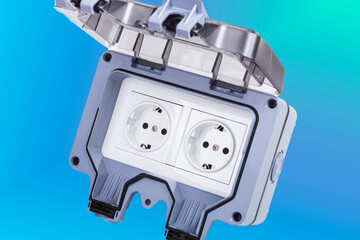Waterproof electrical outlet designed for outdoor use in residential or commercial applications