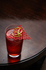 cocktail in a glass on a table in a bar, close-up