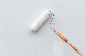 Paint roller with extension pole painting white wall