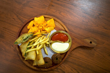 Mix Platter, Food mix of various ingredients of food on wooden plate on the table