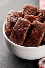 Financier biscuit chocolate cookie sweet dessert fresh delicious gourmet food background on the table rustic food top view copy space