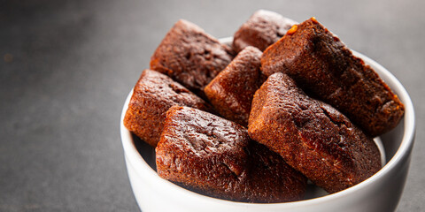 Financier biscuit chocolate cookie sweet dessert fresh delicious gourmet food background on the table rustic food top view copy space