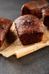 Financier biscuit chocolate cookie sweet dessert fresh delicious gourmet food background on the table rustic food top view copy space