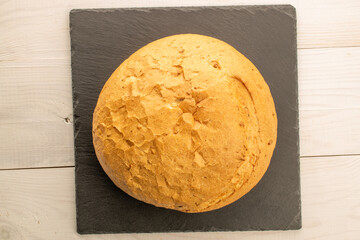 Loaf of white wheat bread, close-up, top view.