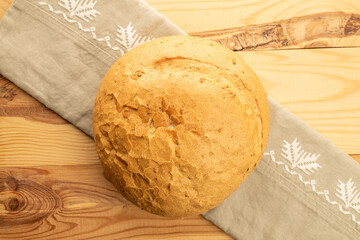 Loaf of white wheat bread, close-up, top view.
