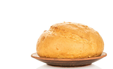 Loaf of white wheat bread, close-up, isolated on white background.