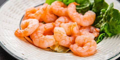 Shrimp salad prawns seafood fresh pescetarian diet gourmet food background on the table rustic food top view copy space keto and paleo diet vegetarian food