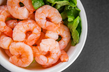 Shrimp salad prawns seafood fresh pescetarian diet gourmet food background on the table rustic food top view copy space keto and paleo diet vegetarian food