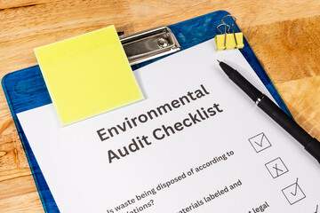 Sustainability Assessment Checklist Paper with Pen on Desk – Eco Compliance Inspection Scene
