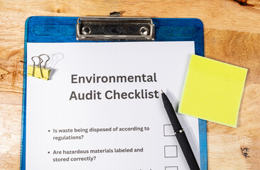 Environmental Audit Checklist Document on Desk with Pen – Sustainability Compliance Concept