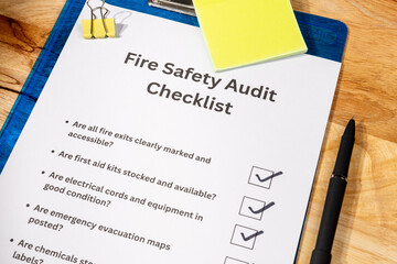 Fire Prevention Inspection Checklist with Pen on Desk – Occupational Safety Compliance Scene