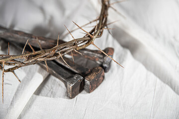 Crown of Thorns and Holy Nails associated with the Passion of Jesus Christ. Symbol of the Crucifixion at Calvary and Good Friday in Christianity according to the New Testament