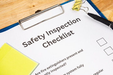 Workplace Safety Inspection Checklist Form with Pen on Desk – Occupational Safety Compliance...