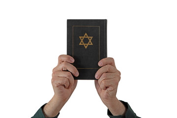 Hands and Hebrew Book Talmud with Star of David on a dark cover on isolated background. Rabbinic Judaism, Studying Jewish religious law. Torah, Hebrew Bible. Holy Scripture containing the word of God
