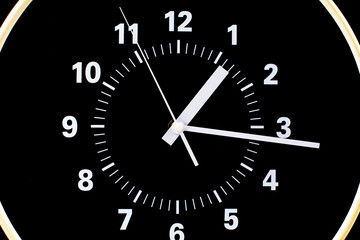 Clocks tell the time of work and life, processes and rules of limited time. Photo of clock in studio.