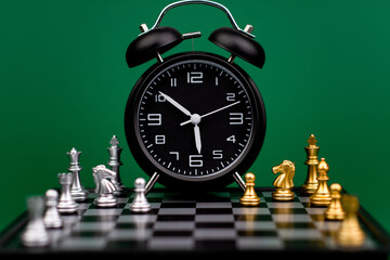 Clocks tell the time of work and life, processes and rules of limited time. Photo of clock in studio.