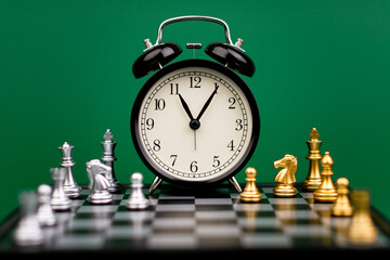 Clocks tell the time of work and life, processes and rules of limited time. Photo of clock in studio.
