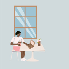 Relaxed coffee break with laptop in minimalist cafe setting.
