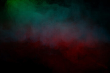 Fototapeta premium Orange and red steam on a black background.