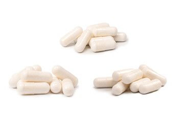 White pill capsule isolated on a white background.