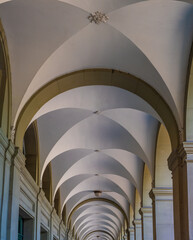 View the vaulted ceilings of on of the many iconic arcades of the streets of the old town of Bern, Switzerland