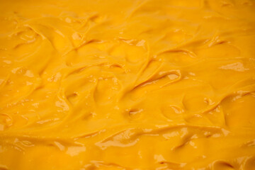 Yellow sauce splashes as a background.