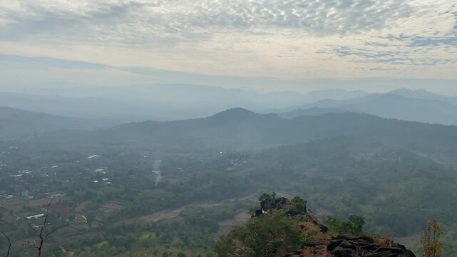 Sunrise in nature, mountain trees and forest aerial view and beautiful nature scenery. Natural landscape backgrounds of wild environment for travel. Clouds over the forest. 