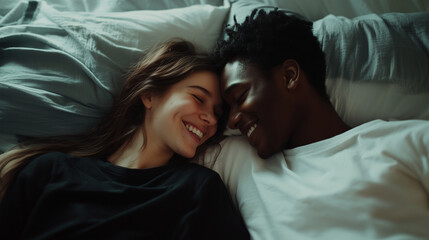 Tender moment between a multicultural couple relaxing in bed, smiling and touching faces with affection and love interracial couple love, happy relationship, cozy bonding, romantic
