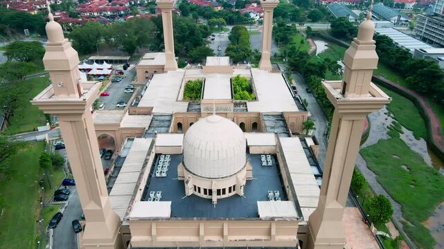 Shah Alam, Selangor, Malaysia - &lrm;March 16, 2025 - Aerial view of the majestic Tengku Ampuan Jemaah Mosque, Bukit Jelutong, Malaysia during the afternoon.