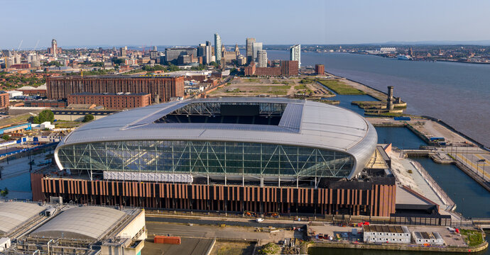 Panoramic Aerial image of Everton New Stadium with Liverpool City Skyline on the background 