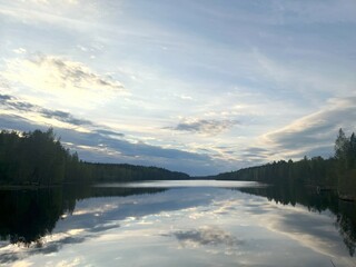 Lake and the reflection of forests in Finland
