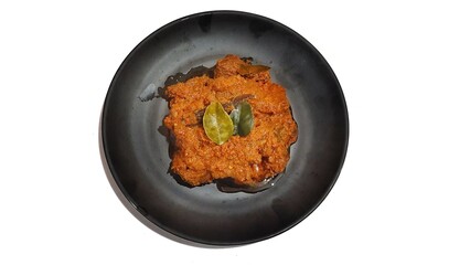 Beef Toppa Lada served in a black plate. Popular Indonesian food from Makassar, South Sulawesi
