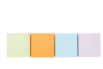 A flat lay arrangement of four colorful sticky notes on a black background, ideal for organization and creative use.