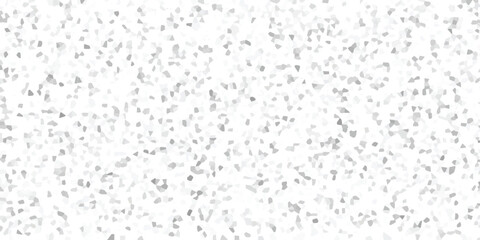 Obraz premium Abstract background with a mosaic of gray and white irregular shapes creating a subtle texture