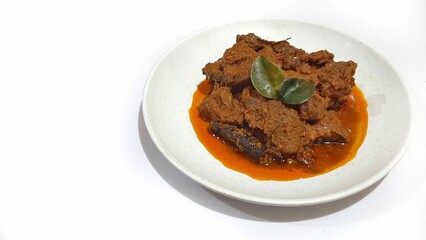 Beef Toppa Lada served in a white plate. Popular Indonesian food from Makassar, South Sulawesi