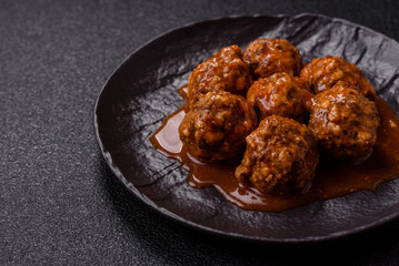 Meat, meatballs in tomato sauce, Italian food, beef or pork with salt . Meatballs with tomatoes