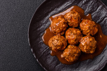 Meat, meatballs in tomato sauce, Italian food, beef or pork with salt . Meatballs with tomatoes