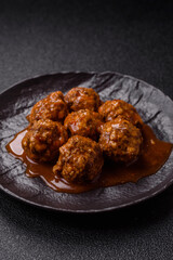 Meat, meatballs in tomato sauce, Italian food, beef or pork with salt . Meatballs with tomatoes