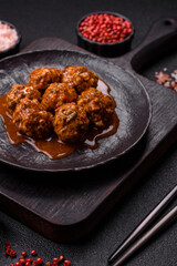Meat, meatballs in tomato sauce, Italian food, beef or pork with salt . Meatballs with tomatoes