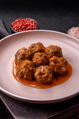 Meat, meatballs in tomato sauce, Italian food, beef or pork with salt . Meatballs with tomatoes