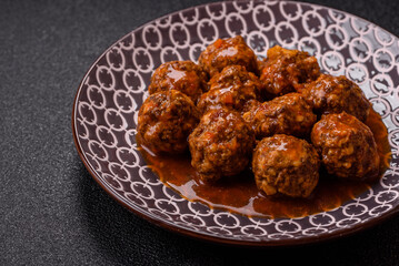 Meat, meatballs in tomato sauce, Italian food, beef or pork with salt . Meatballs with tomatoes