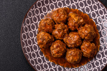 Meat, meatballs in tomato sauce, Italian food, beef or pork with salt . Meatballs with tomatoes