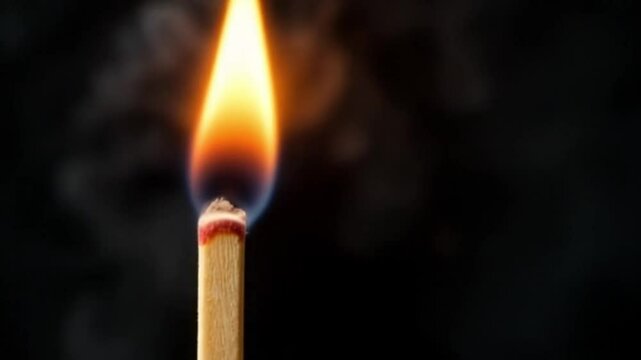 4K Slow Motion Matchstick Igniting with Sparks &ndash; Dramatic Close-Up on Black Background