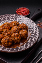 Meat, meatballs in tomato sauce, Italian food, beef or pork with salt . Meatballs with tomatoes