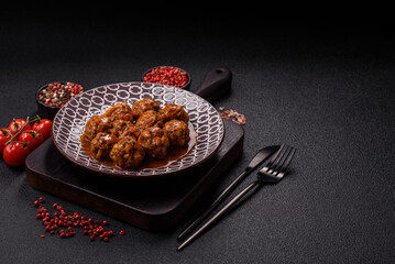 Meat, meatballs in tomato sauce, Italian food, beef or pork with salt . Meatballs with tomatoes