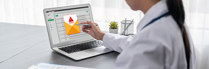 Cyber attacking concept. Malware alert showing on computer screen display scam and threat detection...
