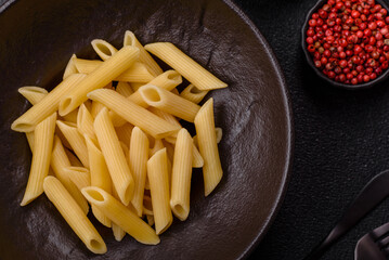 Penne pasta cooked with cheese, salt and spices. Italian food penne pasta