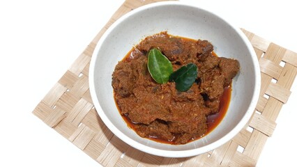 Beef Toppa Lada served in a white bowl. Popular Indonesian food from Makassar, South Sulawesi