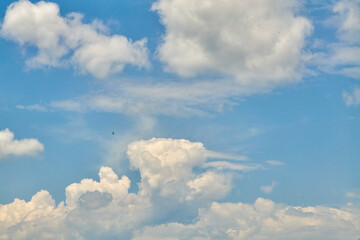 Blue Sky with Puffy White Clouds on a Sunny Day

