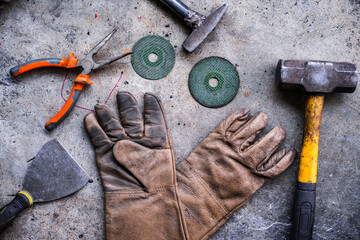 The set of old tools on the floor